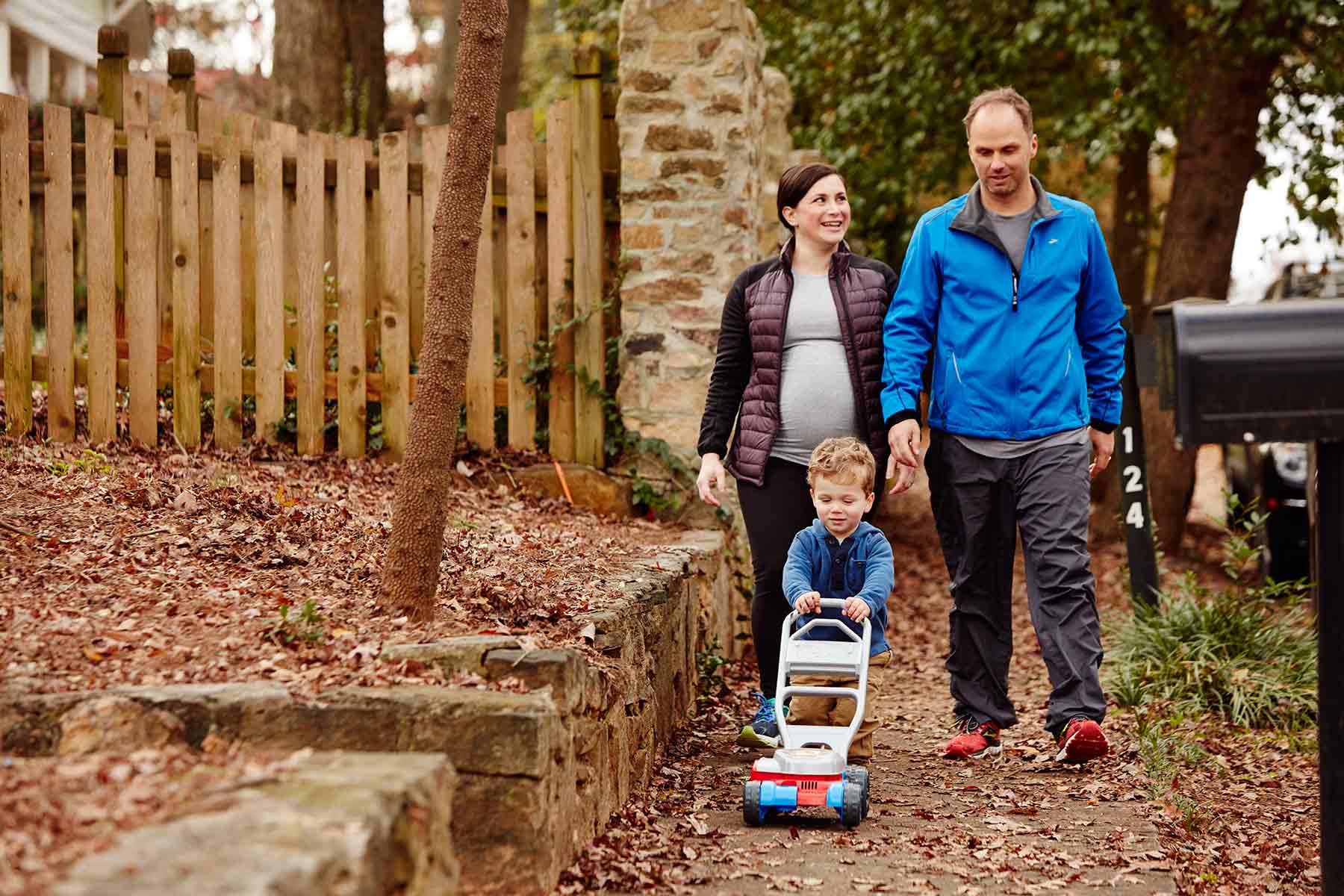 Family walking on a sidewalk together